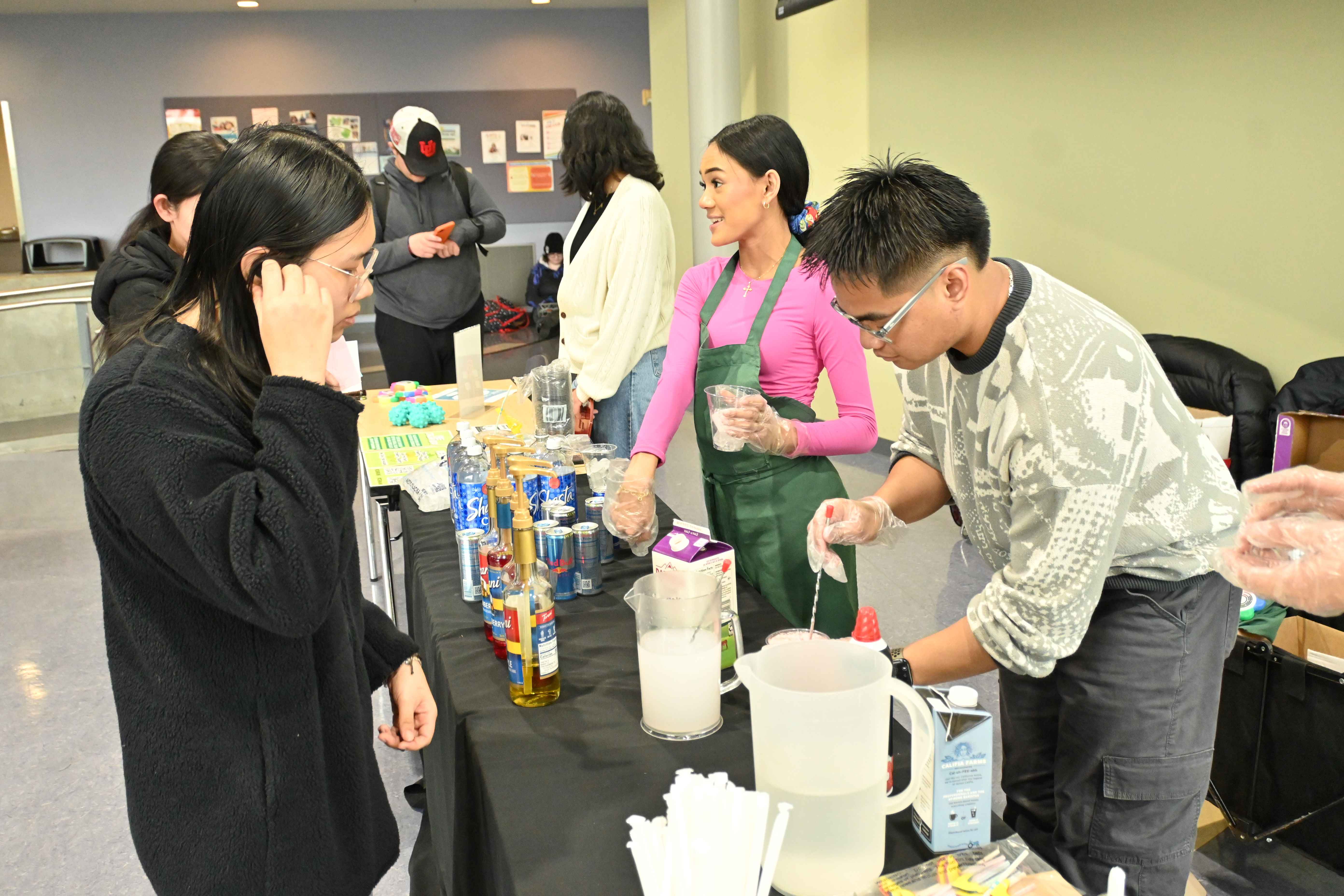 Core Student & Center Staff making italian soda for students
