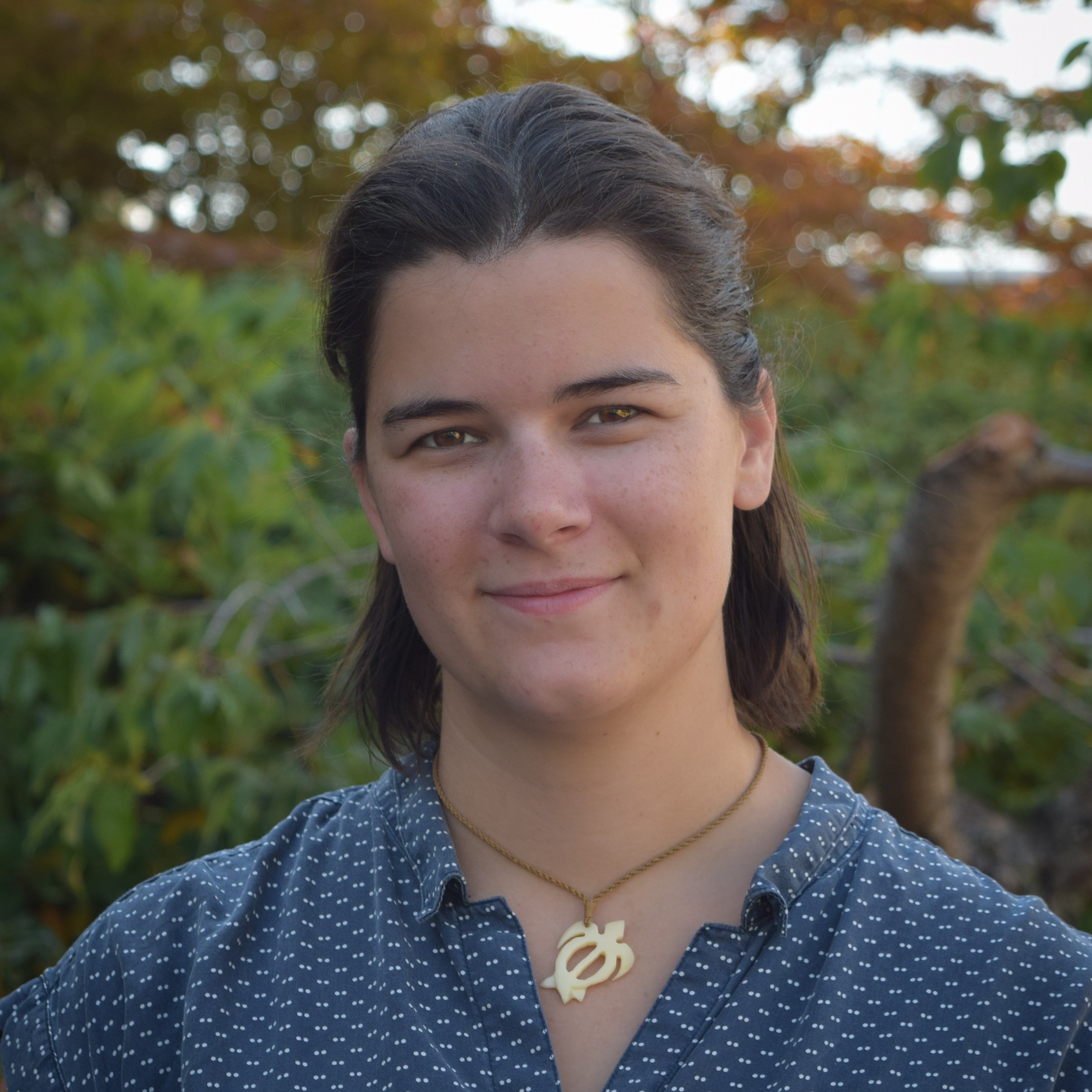 A headshot photo of Lizzie