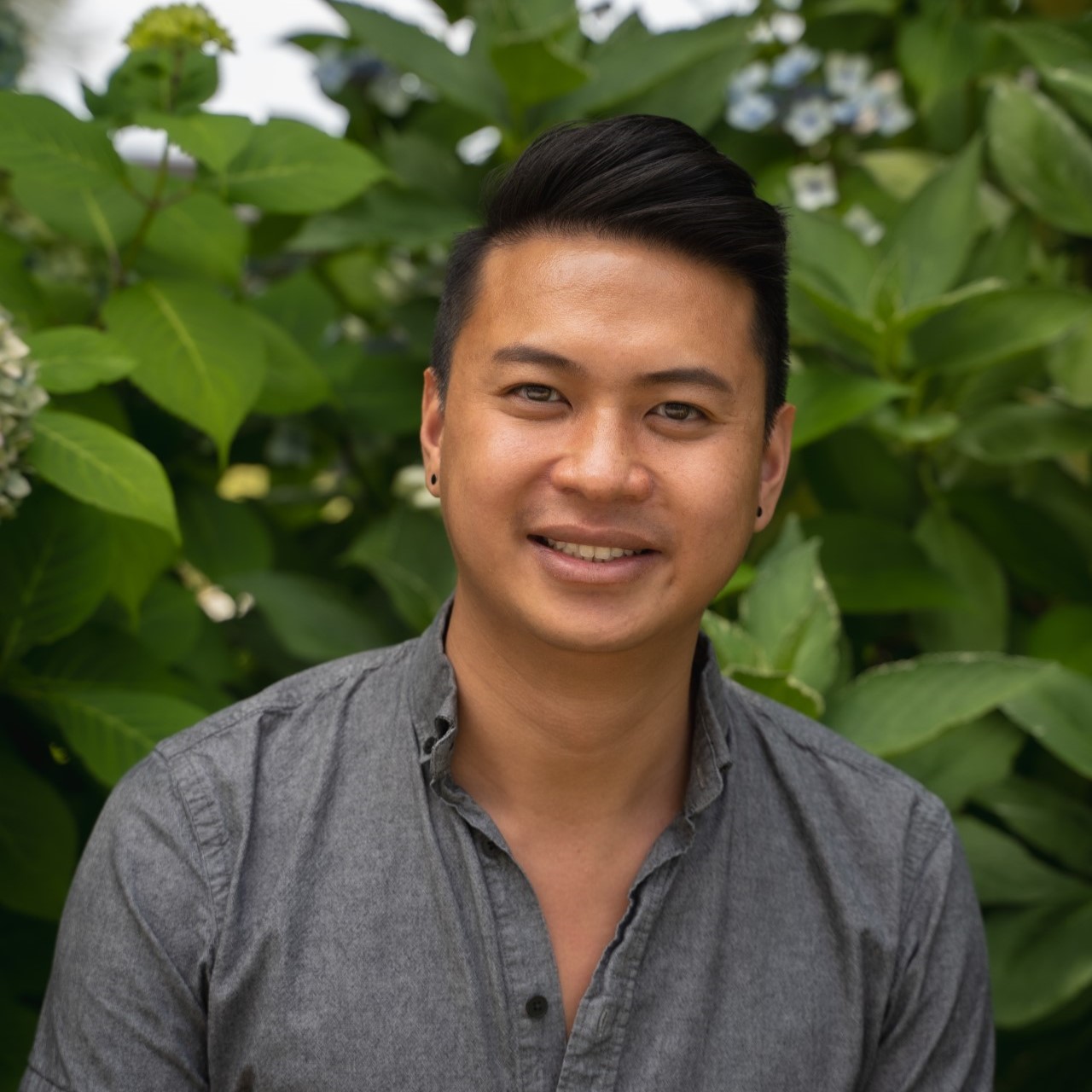 Headshot photo of Tuan